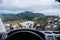 View through windshield to a herd of goats crossing the street in the backland of Corsica