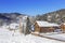 View of the winter Altai, the village of Artybash on the Bank of the Biya river in the morning fog. Altai Republic