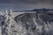 A view of a winter landscape from the top of Radhost Mountain