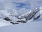 View on winter mountain landscape at Stubai Gletscher ski area with snow covered peaks at spring sunny day. Blue sky