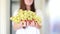 View of woman hands holding bunch of grapes