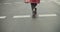 View of woman legs wearing high heels, going by a sidewalk