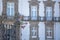 View at the Women talking on balcony on Porto Cathedral , SÃ© do Porto, episcopal palace of Porto as background