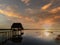 View of a wonderful sunset on a pier on Lake PetÃ©n Itza in El Remate, PetÃ©n, Guatemala