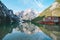 view of wooden boat station at alpine high mountain lake