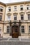 View of a wooden ornamented door in a street in Prague