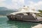 view of the yacht on the pier and the mountain in Budva in Monte