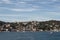 View of yachts and cruise tour boats on Bosphorus and Bebek neighborhood on European side of Istanbul.