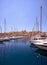 The view of yachts moored in harbor in Dockyard creek with Senglea peninsular on background. Malta