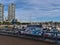 View of Yaletown Dock with marina, buildings and information board of Aquabus that offers connections in False Creek.