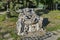 View of yard with rock spring water fountain