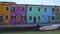 View on yellow, purple, blue and green houses in Burano, architecture in Venice