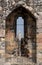 View of York Minster through the arrow slit at the top of historic Clifford`s Tower, England UK