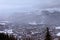 View of Zakopane and Tatra Mountains from Gubalowka in the winter in snowing weather