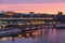 View of Zaryadye Park with soaring bridge, Moscow river with reflection in the water at dawn on new year and Christmas holidays. M