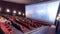 Viewers watch motion picture at movie theatre timelapse
