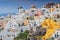 Viewing point of Santorini Caldera Oia white houses and windmills, Oia, Santorini Island, Greece