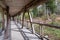 Viewing wooden footbridge for animal watching, Bavaria, Germany. Wooden bridge with a roof in the forest.