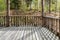 Viewing wooden footbridge for animal watching, Bavaria, Germany. Wooden bridge with a roof in the forest.