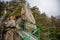 Viewpoint above Jizera valley near castle Vranov, Iron green ladder to the top of the sandstone rocks, Hiking Golden Trail of