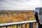 Viewpoint with Coin Binoculars with a Fabulous Landscape with Colorful Hills Covered with Autumn Maples in Vermont New England