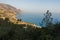 Viewpoint from a hiking trail near Lissos gorge to a coastline above Sougia bay at sunset, south-west coast of Crete island