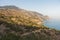 Viewpoint on a hiking trail near Lissos gorge to a coastline above Sougia bay at sunset, south-west coast of Crete island