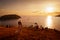 Viewpoint Laempromthep, Phuket, Thailand. Silhouette, Tourists come to watch the sunset and Sailboat tour to watch sunset in the