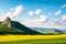 Viewpoint on a landscape of mount Bobija, hills, haystacks, meadows and colorful trees . Close-up of a