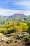 Viewpoint on a landscape of mount Bobija, peaks, hills, rocks, meadows and colorful forests