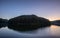 Viewpoint mountain reflection on reservoir at sunset