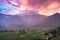 Viewpoint rice field terraced and mountain at colorful sunset in