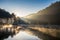 Viewpoint sunlight shine pine forest with swan on foggy reservoir in morning at pang oung