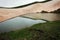 Views of the alpine lake Coruldi where summer does not melt the snow