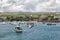 Views of boats and houses arriving at colorful Puerto Baquerizo Moreno