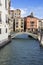 Views of buildings, gondolas, bridges and canals in Ve