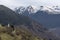 Views of the church of Mont in Vielha with snowy mountains in the background