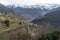 Views of the church of Mont and Vielha town from Montcorbau with snowy mountains in the background