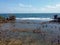 Views of the coral beach with a vast expanse of sea when the tide is low