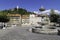 Views of Ljubljana Castle from Novi Square, with the fountain located in the center of the square in the foreground, Slovenia