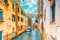 Views of the most beautiful channels of Venice, narrow streets, houses