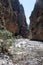 Views in the mountains along the path through the gorge sunny day. View of Gorge, a gorge in the Mountains of Greece, lying on the