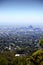 Views overlooking Adelaide city framed by trees and Australian bushland.