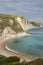 Views of rock formations and beach at durdle dor