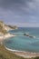 Views of rock formations and beach at durdle dor