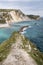 Views of rock formations and beach at durdle dor