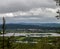 Views from the top of Aavasaksa mountain with houses, forest and mountains