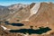 Views from the top of the Garmo Negro of the Infiernos peaks and its marmolera marble wall with the mountain lakes of Pondiellos