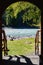 Views of the Turquoise Katun river through the doorway of the tourist lodge, Altai, Russia