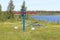 Views of an unmaintained playground by a lake